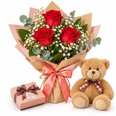 red roses teddy bear and chocolates