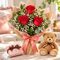 red roses and teddy bear and chocolates